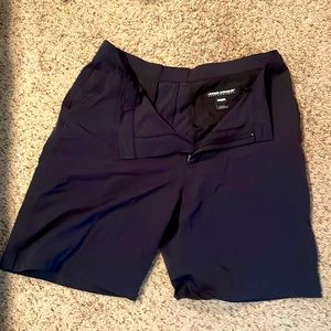 Mens under armour flat front golf shorts. Size 38R. Dark navy
